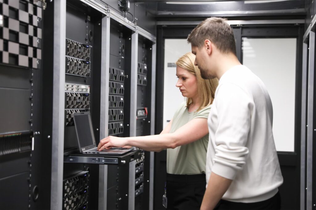 A photo of Aareon colleagues in a data center.